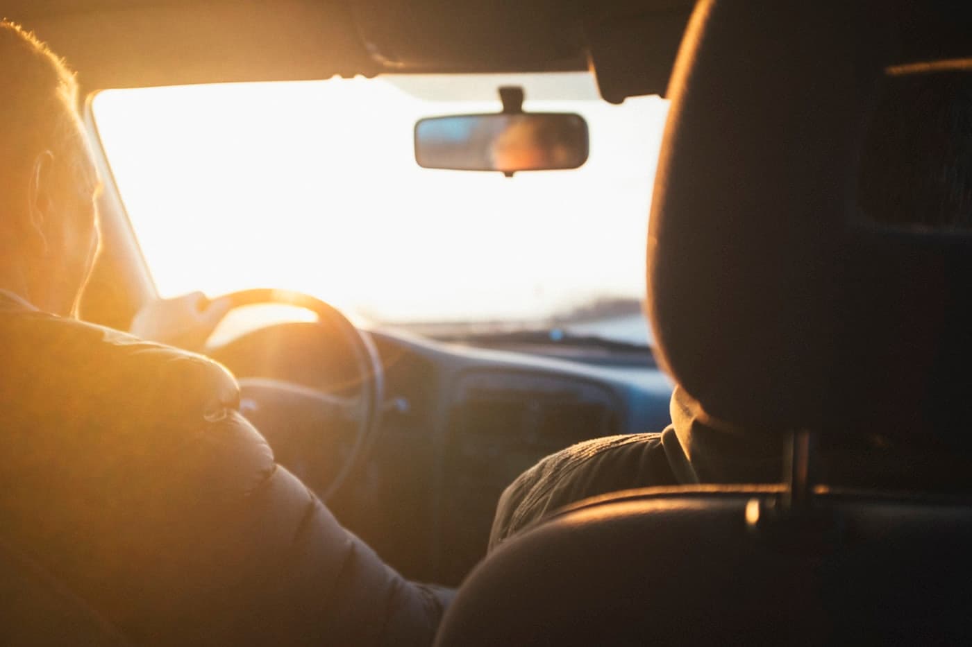 Golden light through the windshield on a test drive